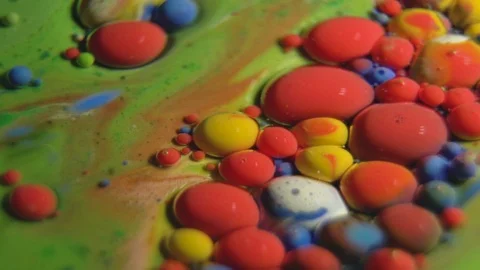 Fantastic abstract paint bubbles moving in slow motion. Chemical reaction of Stock Footage 87234761