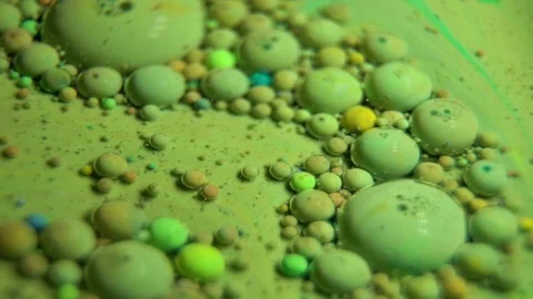 Fantastic abstract paint bubbles moving in slow motion. Chemical reaction of Stock Footage 87235587