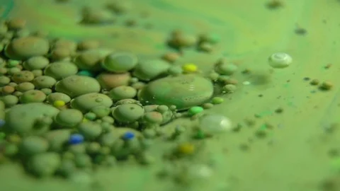 Fantastic abstract paint bubbles moving in slow motion. Chemical reaction of Stock Footage 87235728