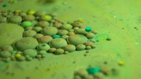 Fantastic abstract paint bubbles moving in slow motion. Chemical reaction of Stock Footage 87235874