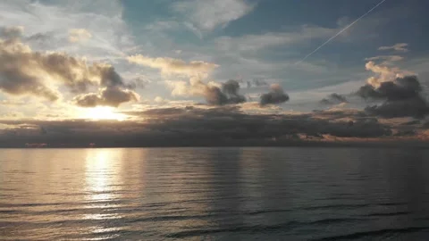 Fantastic aerial sunset over ocean wonderful lights and breathtaking sky Stock Footage