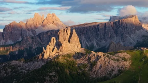 Fantastic aerial view over Cinque Torri glowing at sunset in the Dolomites Stock Footage 314959923