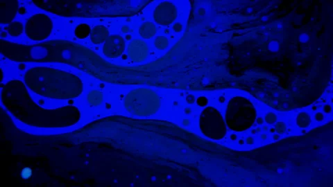 Fantastic black bubbles in blue ink. Scientific experiment, chemical reactions. Stock Footage 149282341