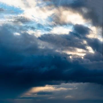 Fantastic clouds at sunrise Stock Photos