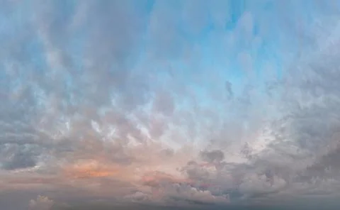 Fantastic clouds at sunrise Stock Photos