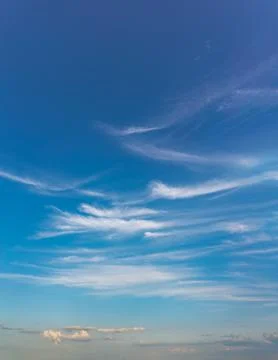 Fantastic clouds at sunrise, vertical panorama Stock Photos