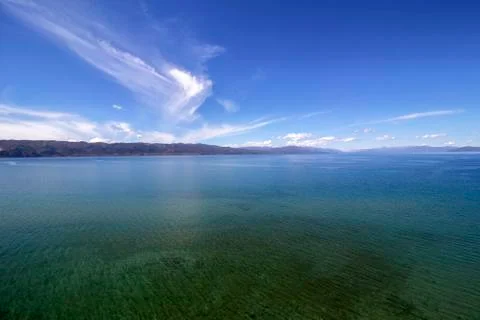 Fantastic cloudy composition over the beautiful Ohrid Lake. Stock Photos