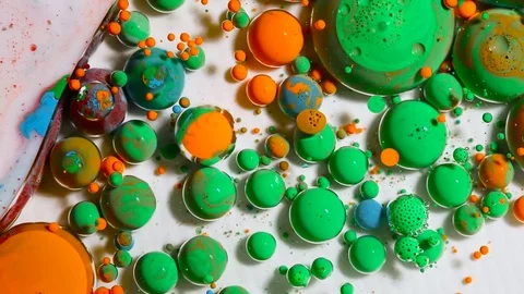 Fantastic colored bubbles of paint on the oil surface Stock-Footage 84856899