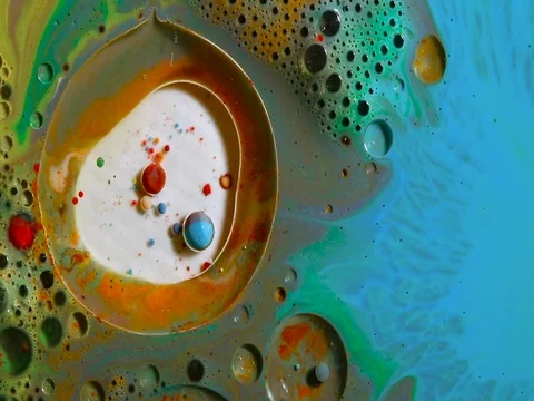 Fantastic colored bubbles of paint on the oil surface Stock Footage 84856959