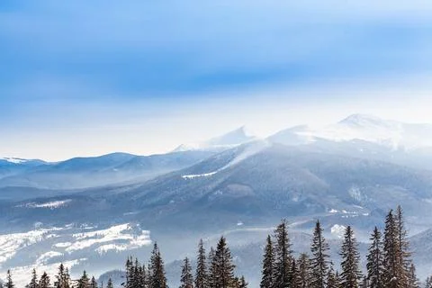 Fantastic evening winter landscape. Dramatic overcast sky. Creative collage Stock Photos