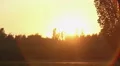 Fantastic golden sunset in summer park, woman walking funny dog on the leash HD Footage