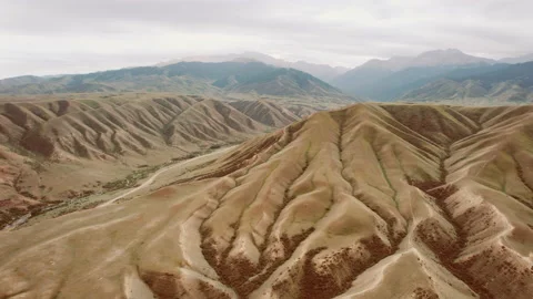 Fantastic mountain range and bare hills, alpine landscape aerial view Stock Footage 213648760