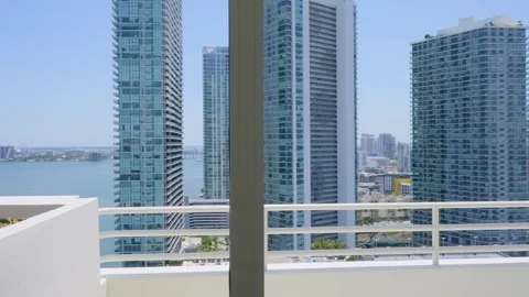 Fantastic panoramic view on high-rise glassy skyscrapers and Atlantic ocean from Stock Footage 247085997