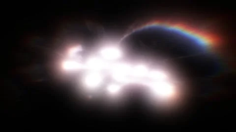 Fantastic play of particles of light on a black background. A magical phenomenon Stock Footage 167620357