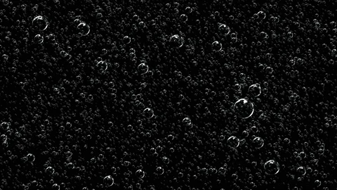 A fantastic sight of countless gas bubbles in the dark. Stock Footage 125164410