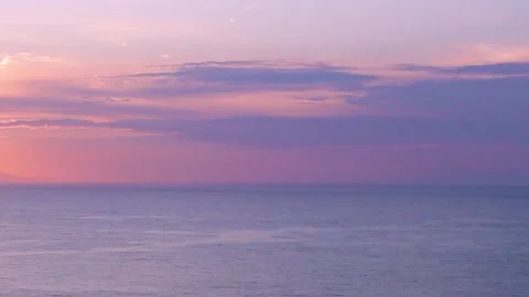 Fantastic Sky Over the Ocean of all Shades of Blue, Pink, Yellow  Stock Footage 250396515