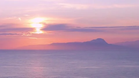 Fantastic Sky Over the Ocean of all Shades of Blue, Pink, Yellow Stock Footage 250396546