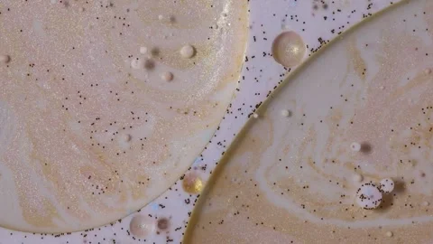 Fantastic structure of colorful bubbles ink in motion. Amazing textures bubbl Stock Footage 169719204