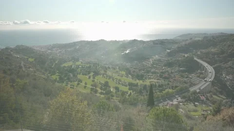 Fantastic sunny view in european valley with his highway, his golf and his city Stock Footage
