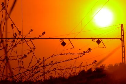 Fantastic sunset between train tracks Stock Photos