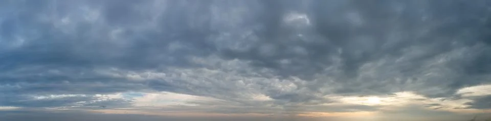 Fantastic thunderclouds at sunrise Stock Photos
