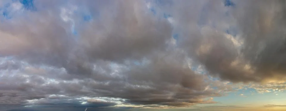 Fantastic thunderclouds at sunrise Stock Photos