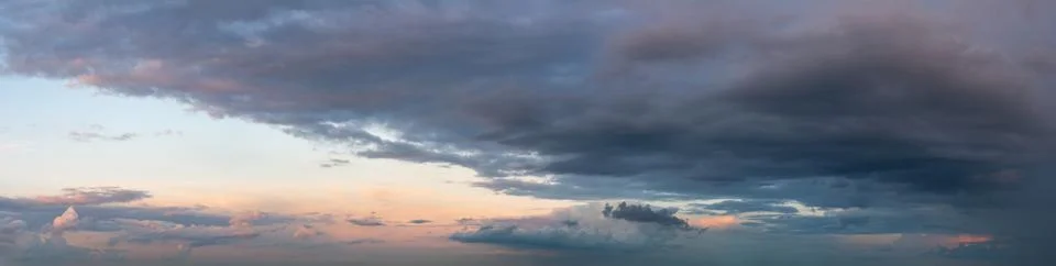 Fantastic thunderclouds at sunrise Stock Photos