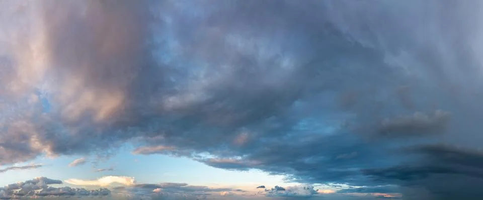 Fantastic thunderclouds at sunrise Stock Photos