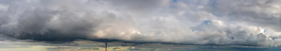 Fantastic thunderclouds at sunrise Stock Photos