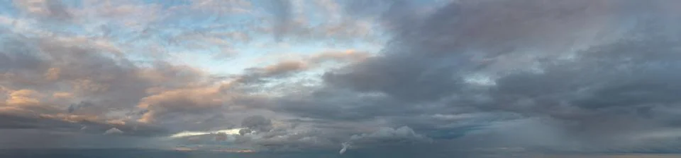 Fantastic thunderclouds at sunrise Stock Photos
