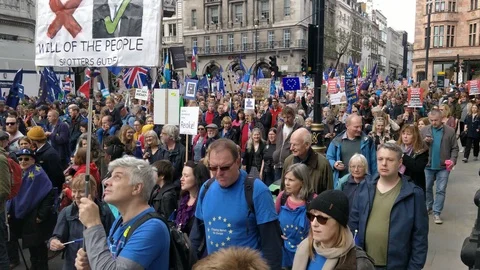 FANTASTIC VIEW OF CROWDS MARCHING AGAINST BREXIT IN 2019 UK 4K Stock Footage 118278322