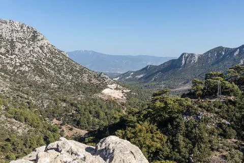 Fantastic view opens from the cliffs to the mountains Stock Photos