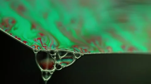 Fantastic water reflection on dark background Stock Footage 298625028
