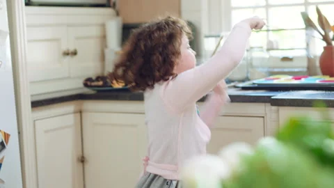 Fantasy, child or wand with spell in home for imaginative play, baking magic or Stock Footage 335944652