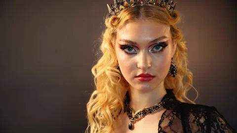 Fantasy elf girl red lips makeup dark queen woman beauty face walking turning Stock Footage 335810665