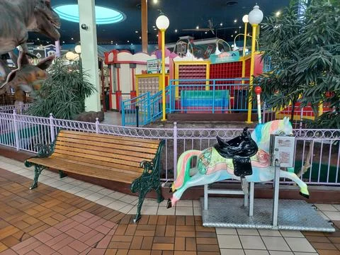 Fantasy Fair Carousel and Play Area Scene Stock Photos
