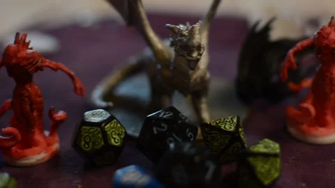 Fantasy figures and dice for dungeons and dragons role playing games. 스톡 동영상 229639583