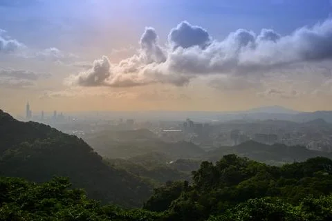 Fantasy orange sky. Dynamic clouds at sunset. Stock Photos