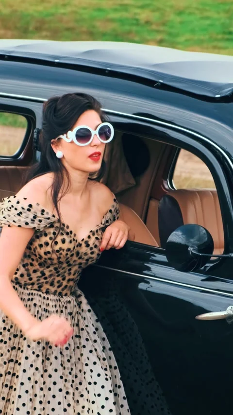 Fantasy portrait elegant happy retro lady woman driver stopped on road resting Stock Footage 340470948