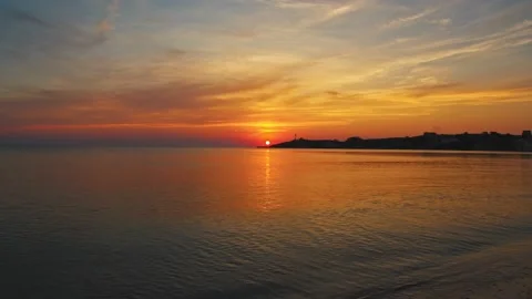 Fantasy sunset over seamlessly looped ocean in 4k (UHD) Stock Footage 135717251