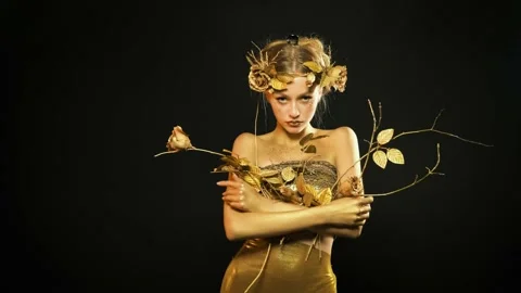 Fantasy woman goddess throws gold artificial metallic branches Stock Footage 164202201