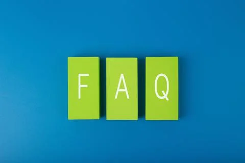 FAQ concept. Light green blocks on blue background Stock Photos