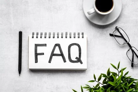 FAQ - fequently asked question - on notebook. Top view Foto stock