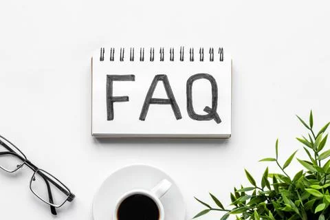 FAQ - fequently asked question - on table ofiice table. Top view Stock Photos