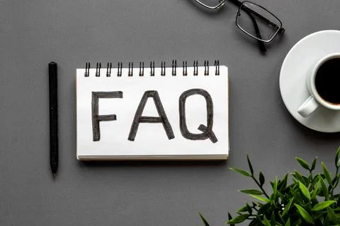FAQ - fequently asked question - on table ofiice table. Top view Stock Photos