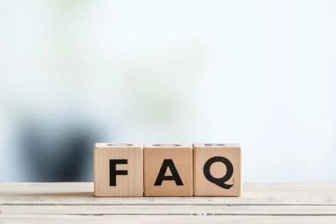 FAQ sign on an office table Stock Photos