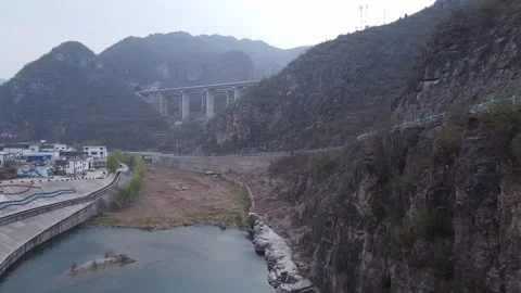 Far bridge and dam Stock Footage 247363251