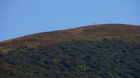 Far cross on the mountain Stock Footage 69084119