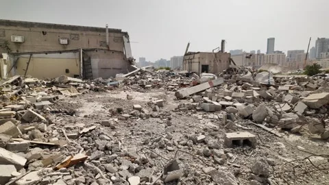 Far from the modern skyline of the UAE, abandoned structures stand quietly in Stock Footage 335947362