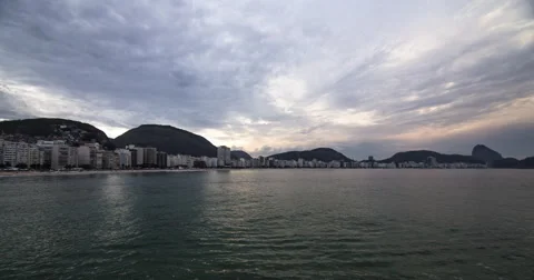 Far View of Sunset at Copacabana Beach, Rio de Janeiro, Brazil, Timelapse Video stock 64864026